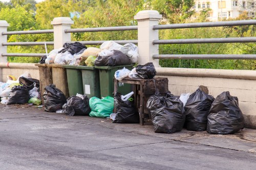 Containers filled with various types of builders waste